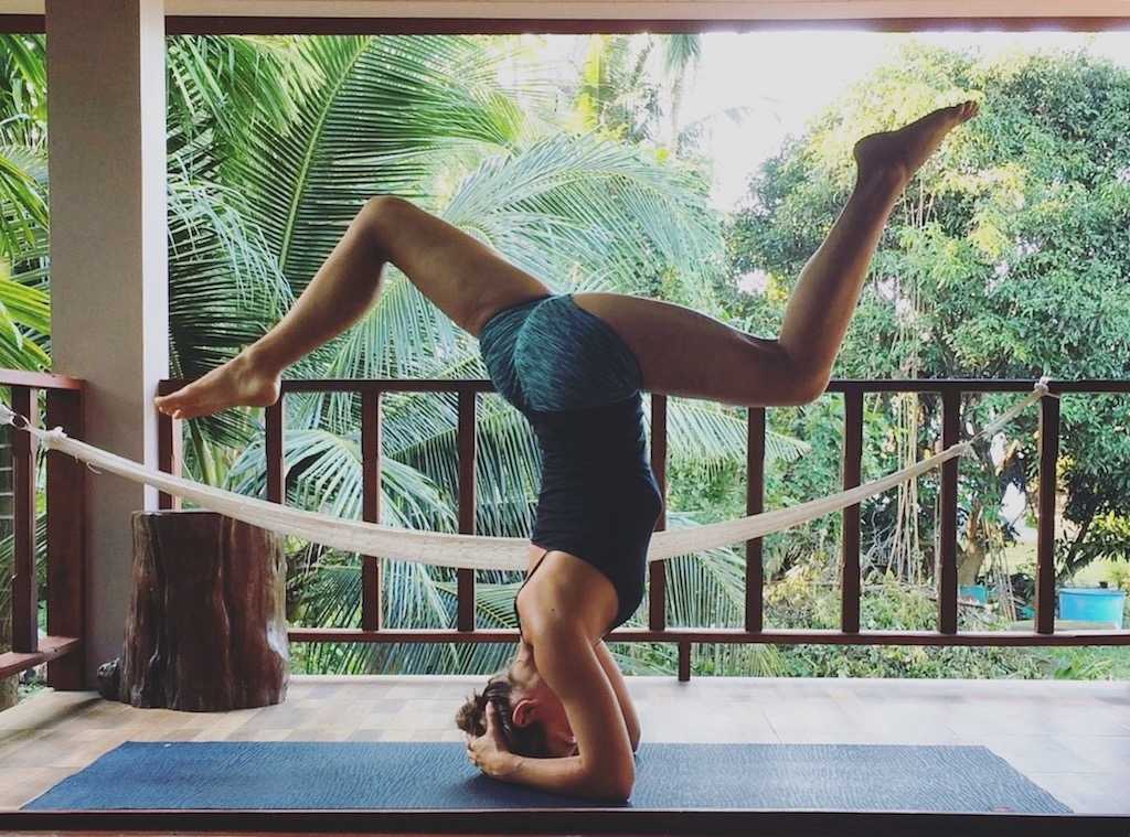 traveling yoga teacher Tasha in headstand
