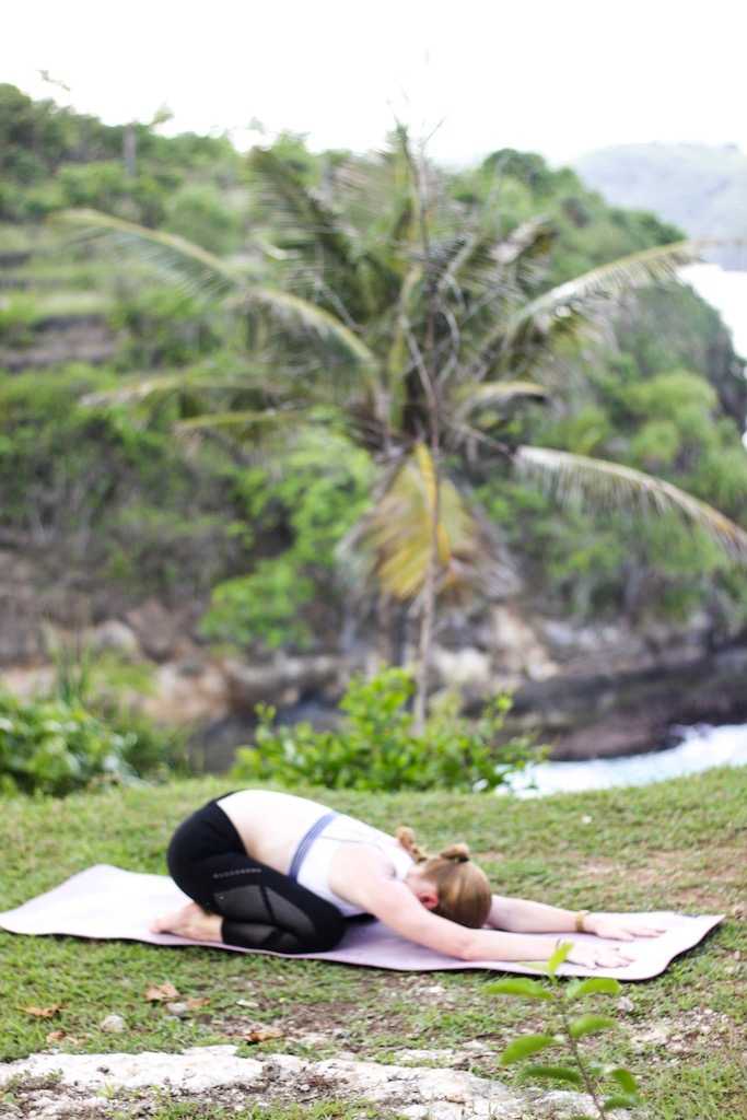 child's pose with extended arms