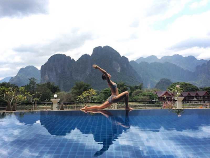 traveling yogini teaching yoga in Laos